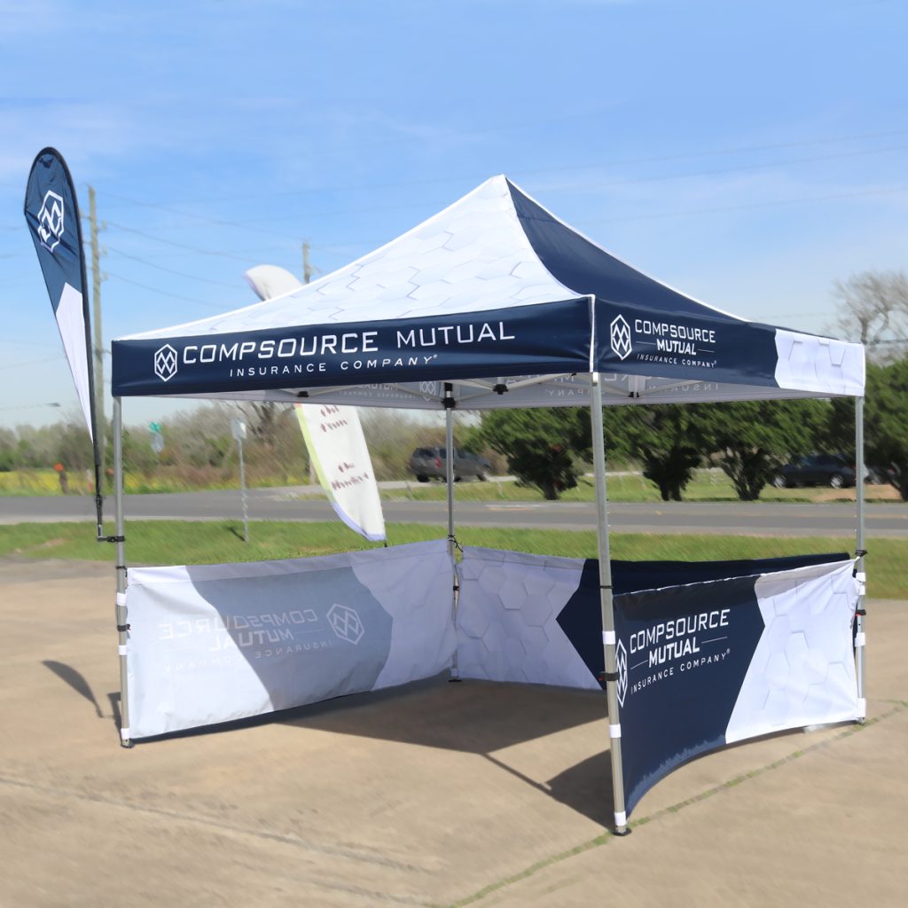Lightweight pop-up tent providing shade and branding outdoors.