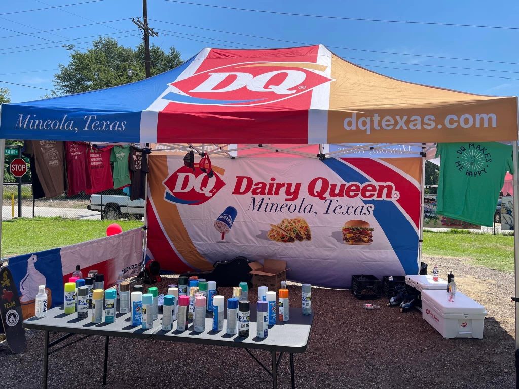 Portable pop-up tent in vibrant colors for trade shows.