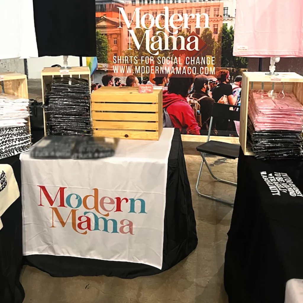 Custom table runner with step & repeat backdrop.
