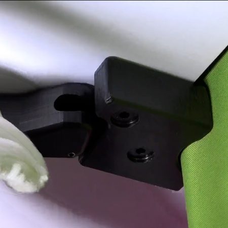 Place the table on top of the pole and secure it with the fixed clamp on the underside.