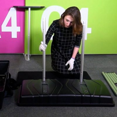 Insert the four longer poles into the holes on the top of the case.